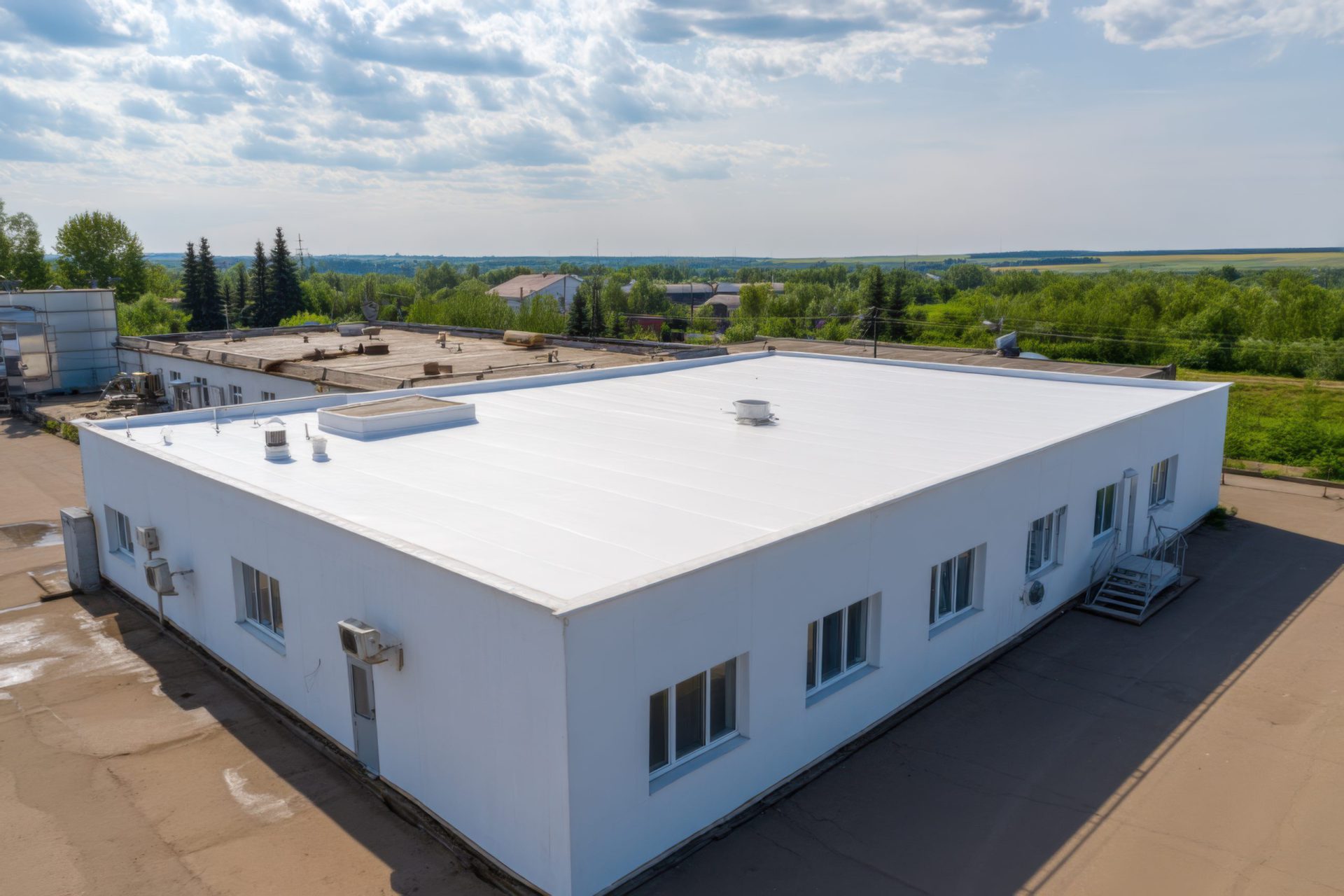 Enhancing Building Durability with Premium Flat Roofs